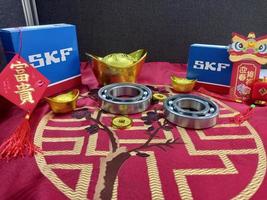 Medan, Indonesia - January 20, 2022 SKF Bearings on table for greetings Chinese new year photo