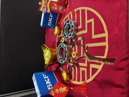 Medan, Indonesia - January 20, 2022 SKF Bearings on table for greetings Chinese new year photo