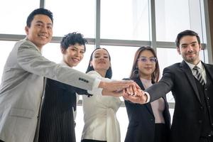 Business Team Touching Hands Together photo