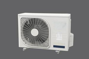 Condensing unit of air conditioning systems on gray background with clipping path. photo