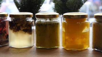 Kraft Honey in Jars on the Showcase of a Restaurant