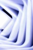 Light abstraction. Vertical background banner. Parts of glowing squares. photo