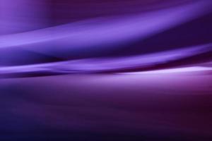 Horizontal purple festive background with waves, lines, highlights and slight blur. Abstraction. Backdrop with gradient gradient. photo