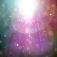 A light rays background with bokeh effect and glowing star particles vector