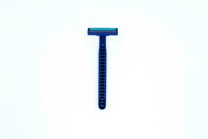 Flat Lay Shot of A Blue Razor Bottom in The Minimalist White Background, Landscape Mode photo