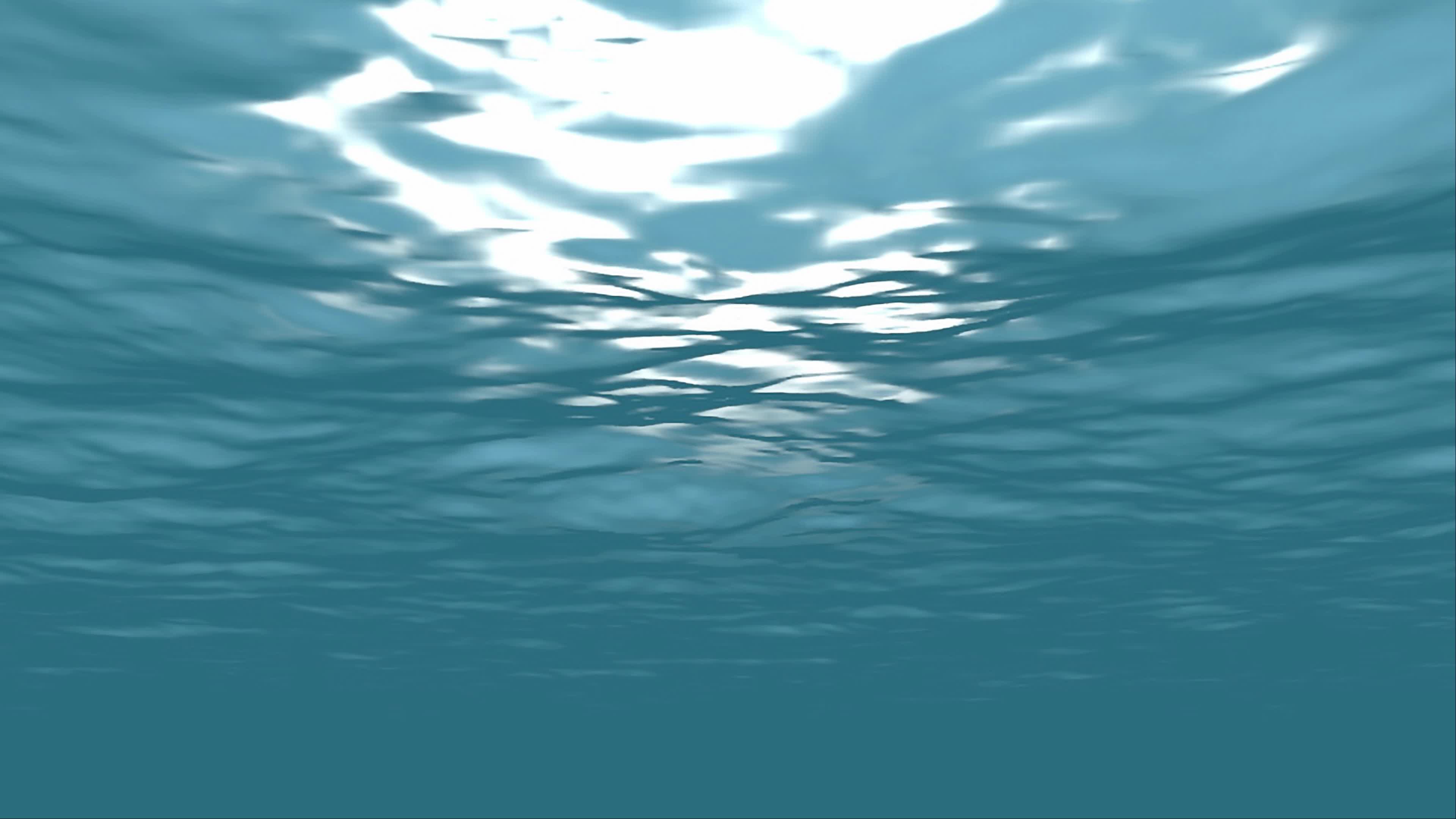 Underwater light filters down through blue ocean waves 5357500 Stock Video at Vecteezy