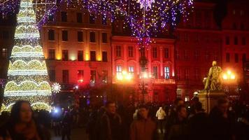 Night life in the City - many People on a Market Square on New Year Celebration video