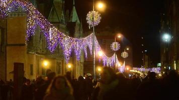 Night life in the City - many People on a Market Square on New Year Celebration video