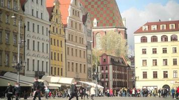 Market Square in Wroclaw City Centre - many People tourists in sunny Day