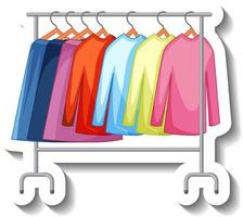 Clothes hanging on clothes rack vector