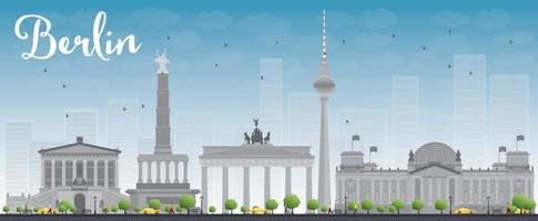 Berlin skyline with grey building and blue sky.