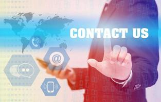 Business Technology concept, Hand touching Contact us sign photo