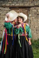 Peruvian andean womans posing in diferents actions photo