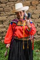 Peruvian andean womans posing in diferents actions photo