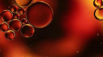 Abstract Colorful Food Oil Drops Bubbles and spheres Flowing on Water Surface, macro Videography video