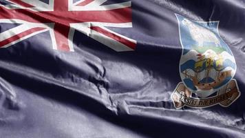 bandeira têxtil das ilhas falkland acenando no loop de vento. bandeira das ilhas falkland balançando na brisa. tecido tecido têxtil. fundo de preenchimento completo. loop de 10 segundos. video