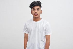 Handsome Indian young boy wearing white t-shirt. photo