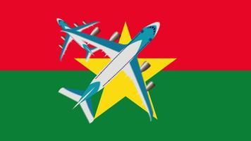 Flag of Burkina Faso and planes. Animation of planes flying over the flag of Burkina Faso. Concept of flights within the country and abroad. video