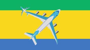 Flag of Gabon and planes. Animation of planes flying over the flag of Gabon. Concept of flights within the country and abroad. video