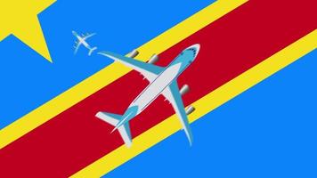 flagga för den demokratiska republiken Kongo och flygplan. animering av plan som flyger över den demokratiska republiken Kongos flagga. koncept för flygningar inom landet och utomlands. video