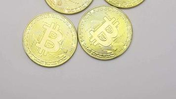 Crypto currency, bitcoin. BTC, Bit Coin. Blockchain technology, bitcoin mining. Macro shot of rotating bitcoins video