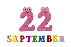 September 22 on white background, letters and numbers. photo