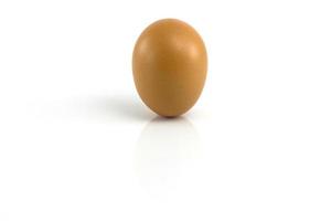 egg isolated from the others over white background photo