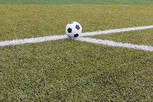 Soccer ball on field texture