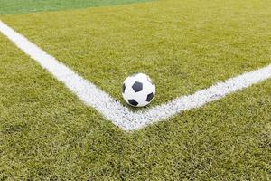 Soccer ball on field texture
