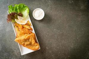 fish and chips - fried fish fillet with potatoes chips photo