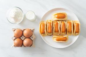 flat pancake roll with sausage photo