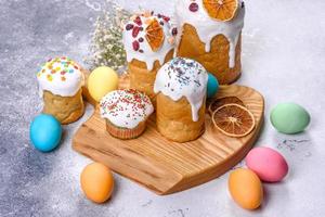 Easter cake and Easter eggs festive celebration table setting traditional decoration and treats photo