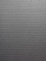 grey corrugated cardboard texture background photo
