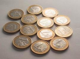 Many one Euro coins photo