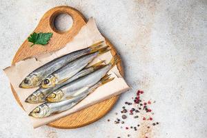 sprat fish herring smoked salted seafood fresh portion pescatarian diet photo