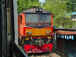 BANGKOK THAILAND08 APRIL 2019The locomotive of the Thai railway is passing through the railway community. photo