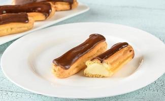 Eclairs with chocolate topping