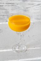 Glass of Mango Cocktail photo