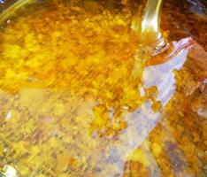 Background texture, dropping drops of sweet honey photo