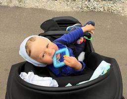 Beautiful baby boy with child face posing photographer photo