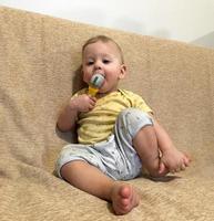 Beautiful baby boy with child face posing photographer photo