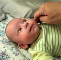 Beautiful baby boy with child face posing photographer photo