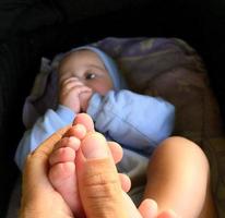 Beautiful baby boy with child face posing photographer photo