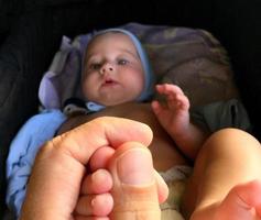 Beautiful baby boy with child face posing photographer photo