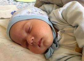 Beautiful baby boy with child face posing photographer photo