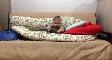 Beautiful baby boy with child face posing photographer photo