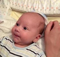 Beautiful baby boy with child face posing photographer photo