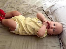 Beautiful baby boy with child face posing photographer photo