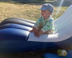 Beautiful baby boy with child face posing photographer photo