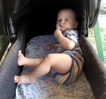 Beautiful baby boy with child face posing photographer photo